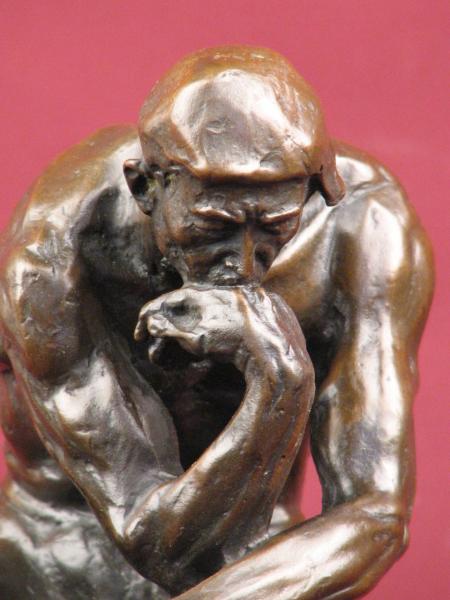 nude bronze sitting man | male form sculpture
